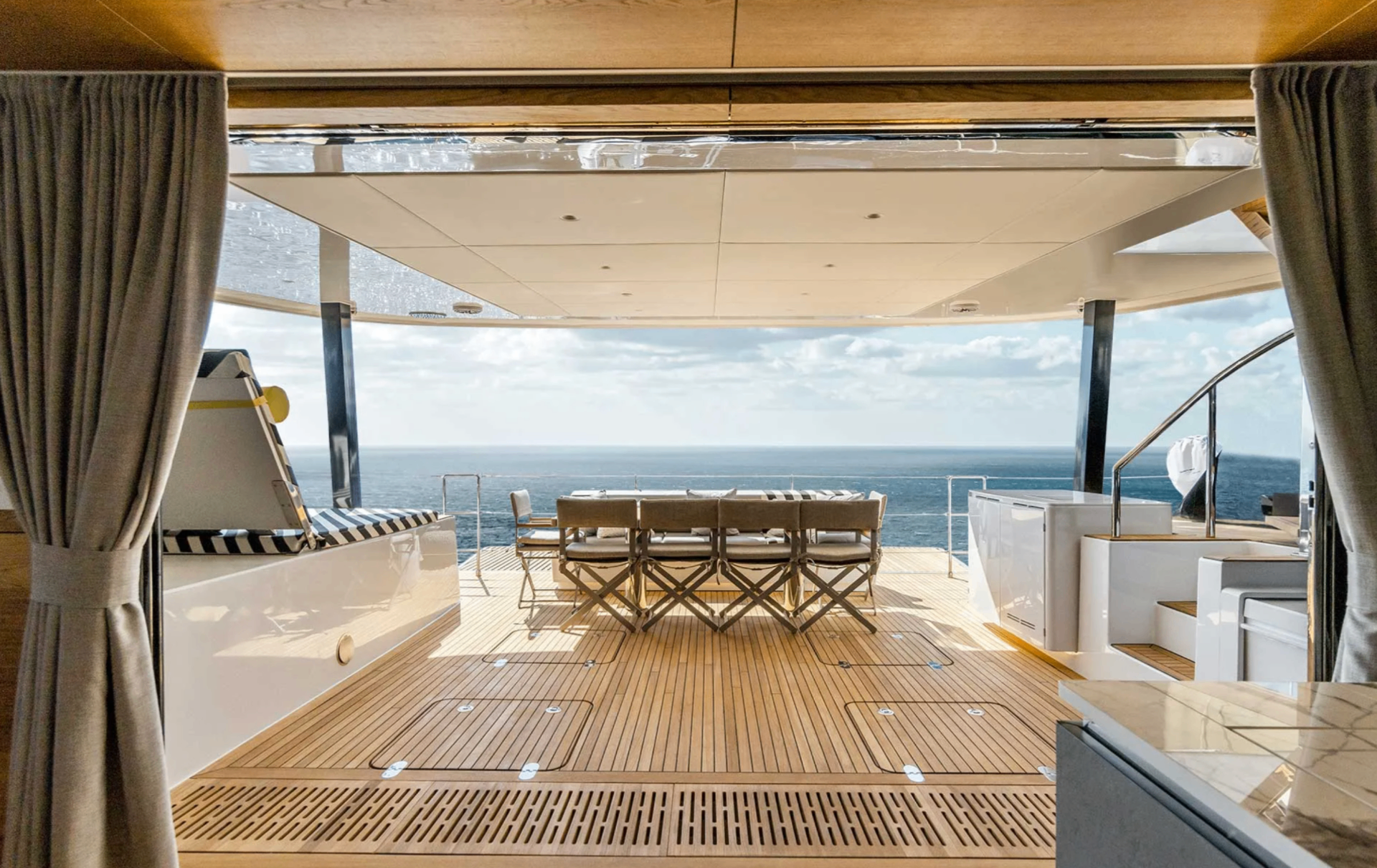 Aft cockpit dining on teak decks